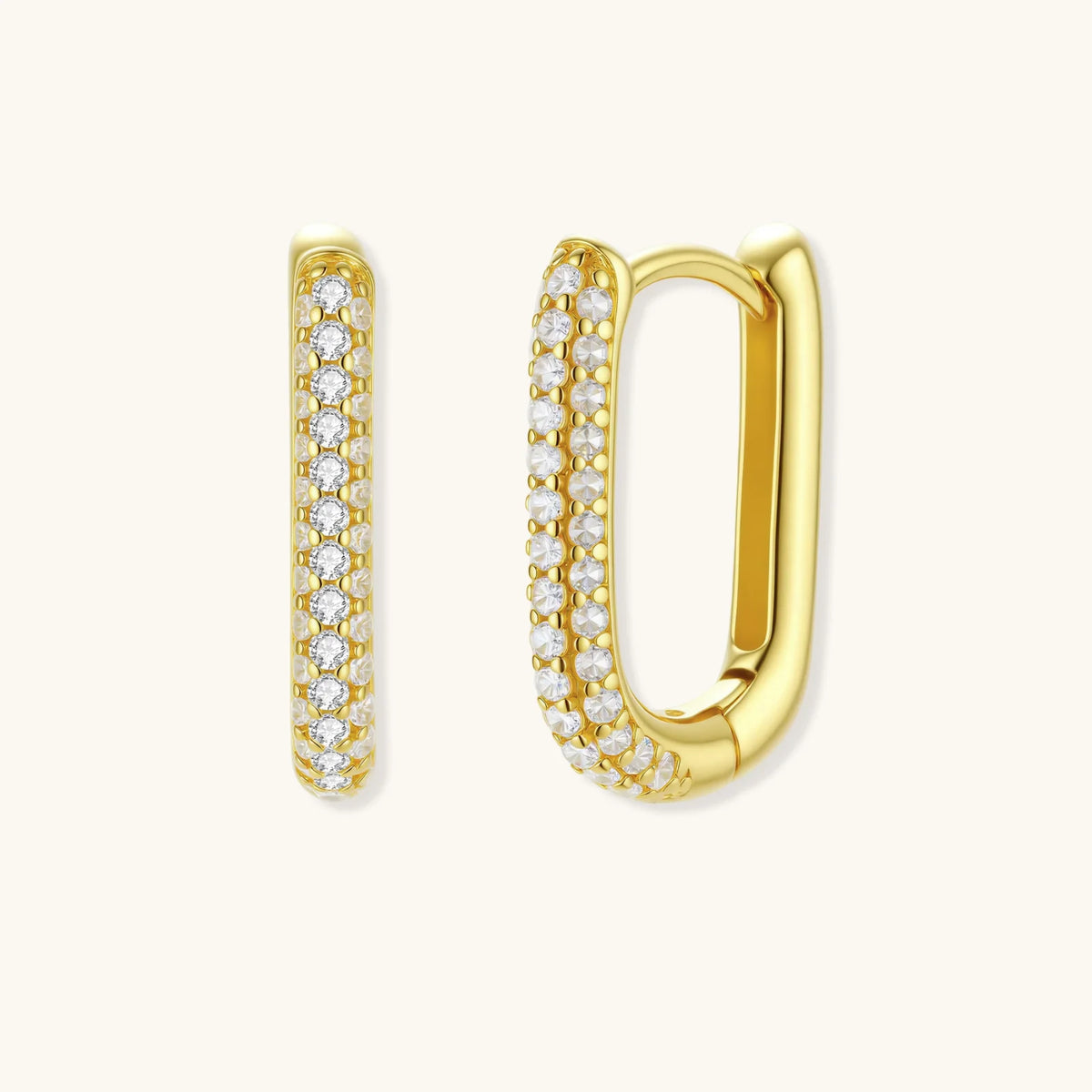 golden hoop earrings with tan background