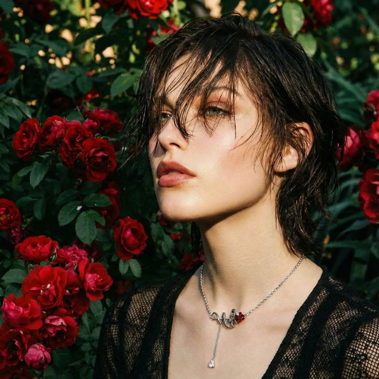 Women model with serpent necklace on from dark romance collection