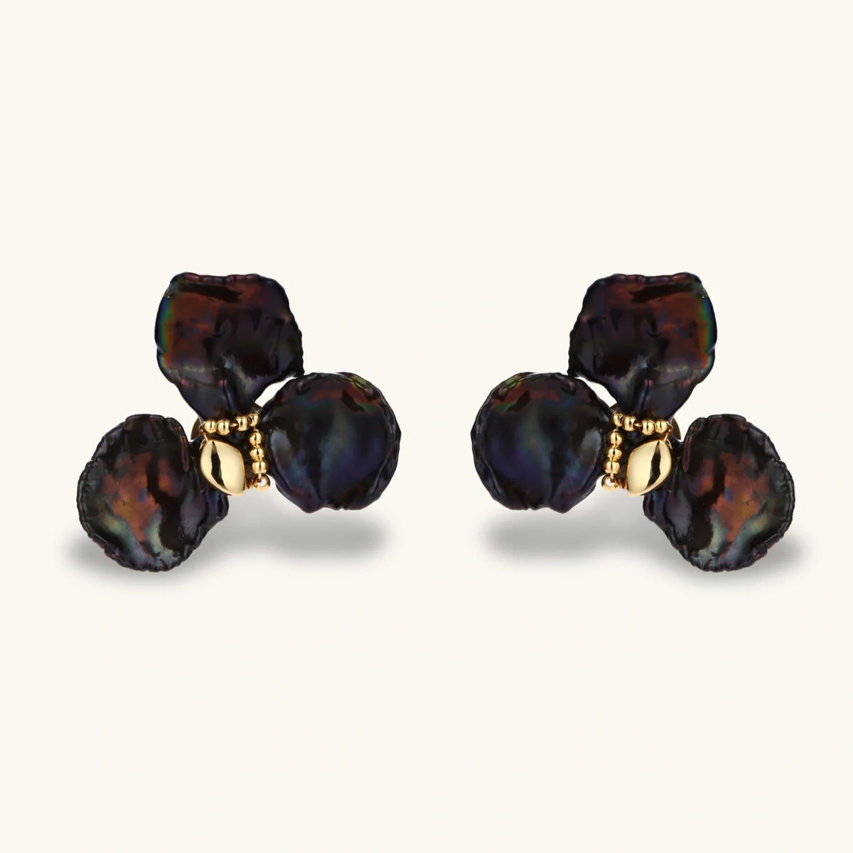 moonlit garden collection, picture of earrings as apart of the collection called "she blooms at night" earrings 