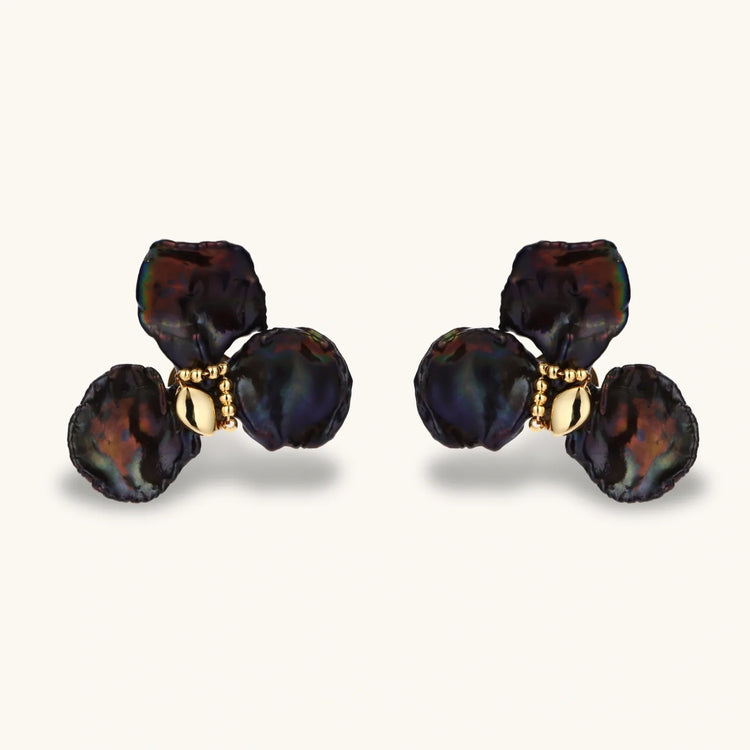 moonlit garden collection, picture of earrings as apart of the collection called "she blooms at night" earrings 
