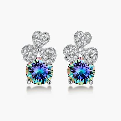 Sterling silver stud earrings with four-leaf clover design featuring small crystals above round moissanite stones