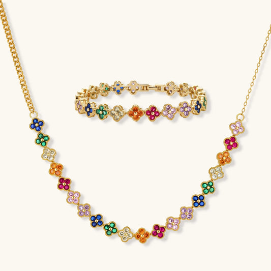 Colorful floral necklace and bracelet set on a white background