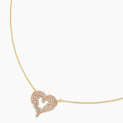 18K gold-plated 925 silver open heart pendant necklace with scattered cubic zirconia stones on a fine cable chain.
