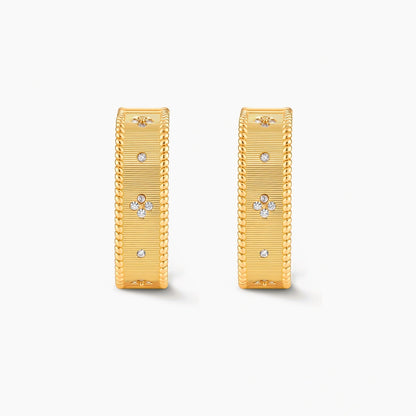 Square huggie hoop earrings in 18K gold-plated silver with ribbed texture, rope borders, floral CZ clusters, and filigree inner lace.
