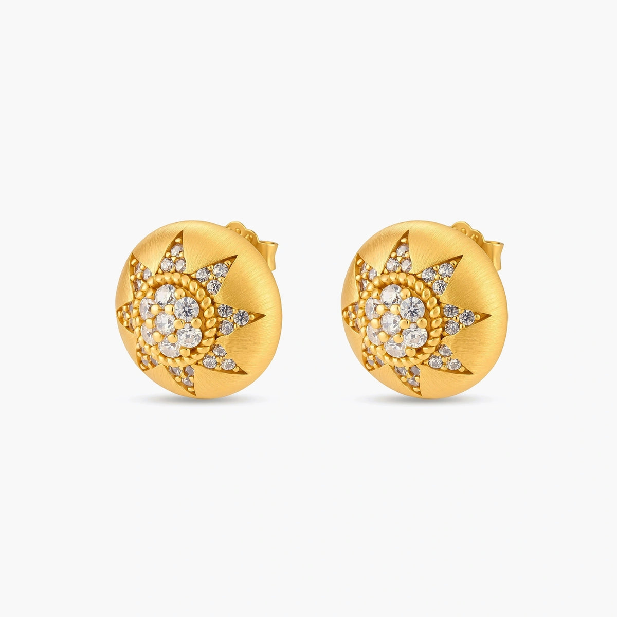 Round domed gold-plated stud earrings with brushed finish and an 8-point star paved in cubic zirconia stones.