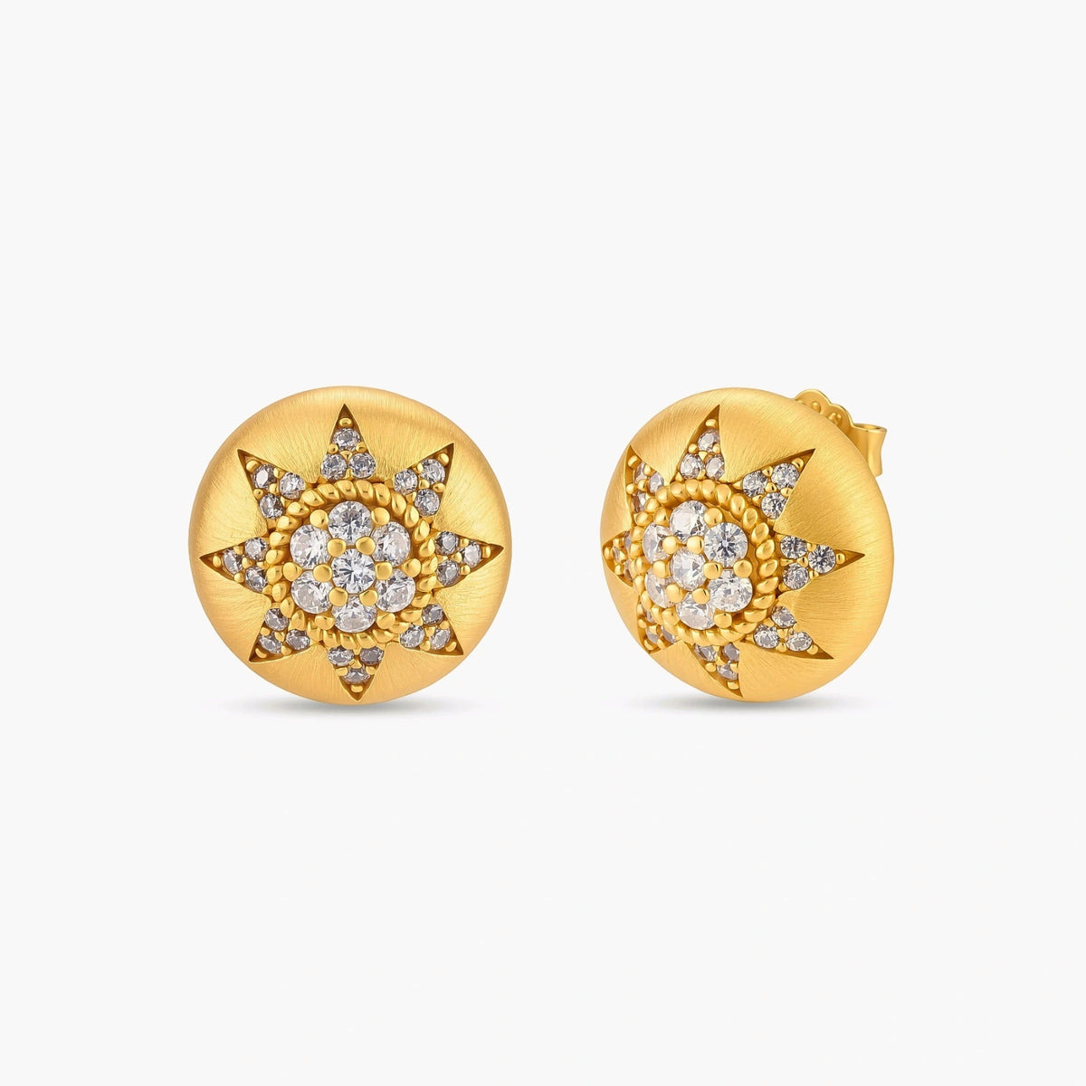 Round domed gold-plated stud earrings with brushed finish and an 8-point star paved in cubic zirconia stones.