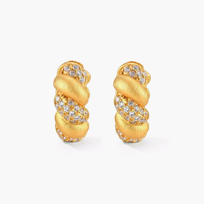 Pair of 18K gold-plated 925 silver huggie hoops with twisted braid texture and pavé cubic zirconia detailing, 15mm.