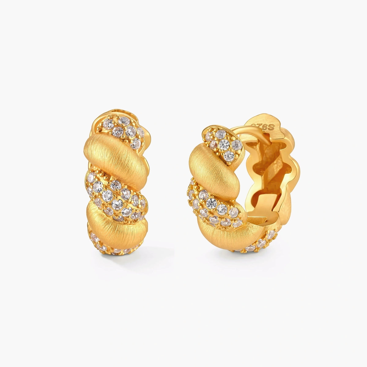 Pair of 18K gold-plated 925 silver huggie hoops with twisted braid texture and pavé cubic zirconia detailing, 15mm.
